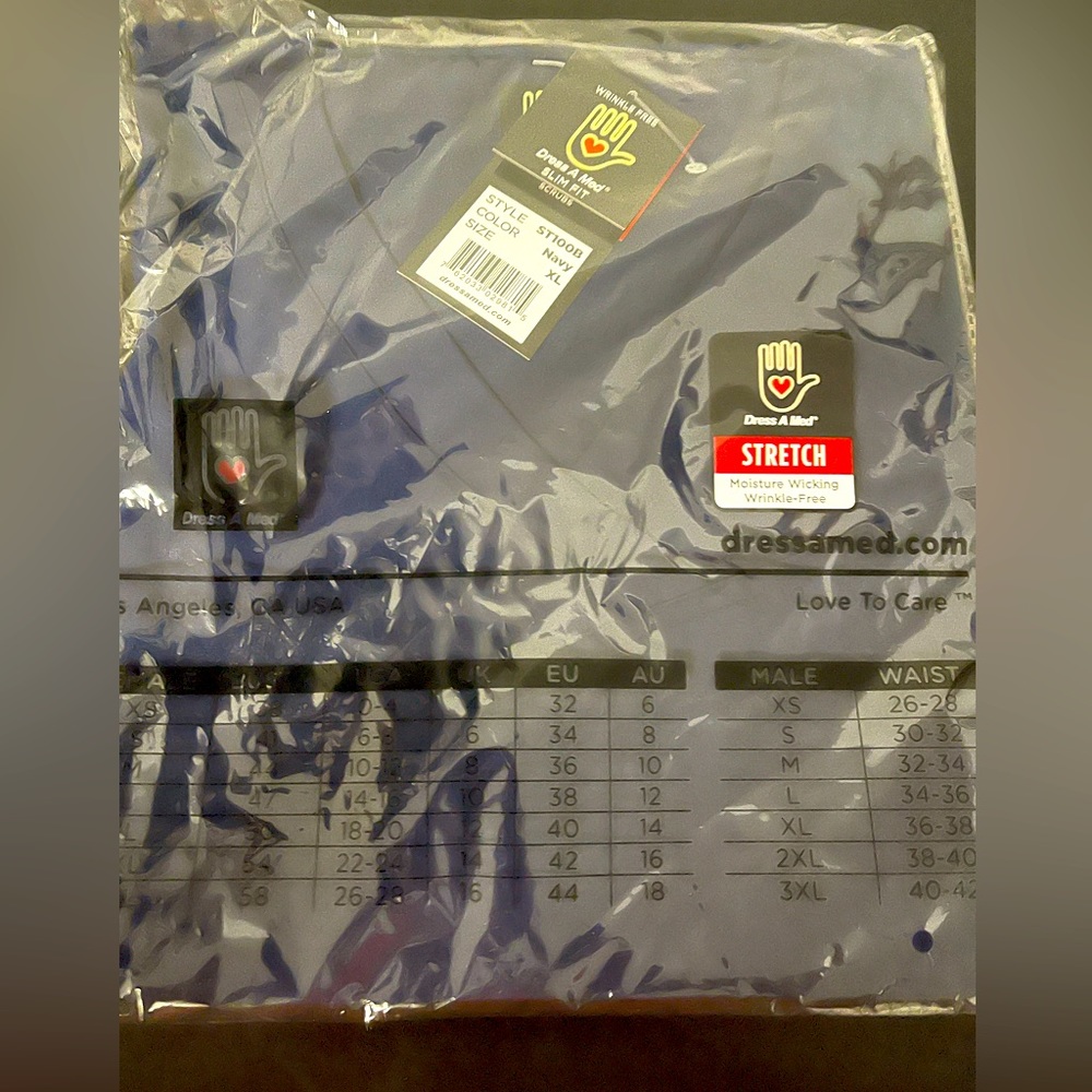 Scrub tops. Sold separately or together. Navy, maroon, slate Dress a med.